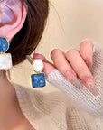 LUCE COLLECTION
Asymmetry Statement piece Square Dangle Earrings