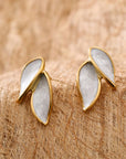 LUCE COLLECTION
Durable and Light weight White/Orange Enamel Leaf Leaves Stud Earrings for all - day wear
