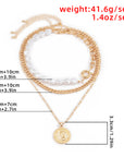 The Lune Collection
Layered Baroque Pearl Coin Pendant / Choker Necklace