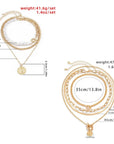The Lune Collection
Layered Baroque Pearl Coin Pendant / Choker Necklace