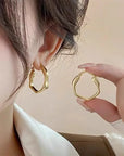 The Esla Geometrical Design Metal Ear Buckle Vintage