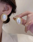 The Lune Collection 
Delicate Baroque Pearl Oval Stud Earring