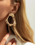 The Esla Gold Color Hollow Stud Earring