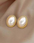 The Lune Collection 
Delicate Baroque Pearl Oval Stud Earring